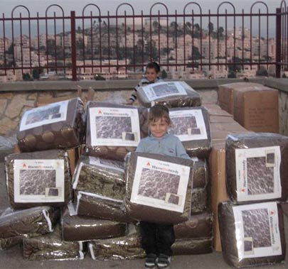 Boy holding blankets